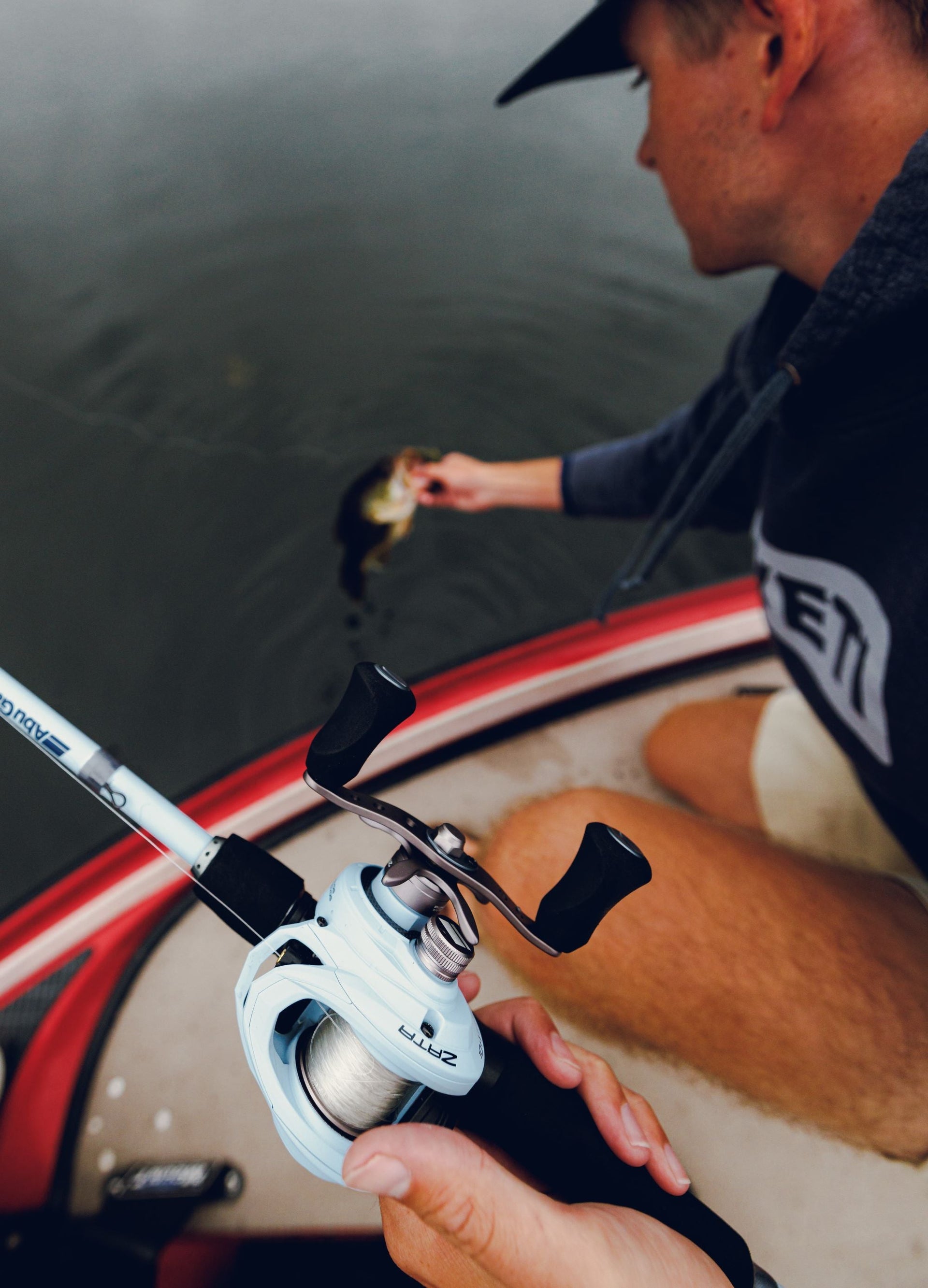 Man pulling fish out of the water