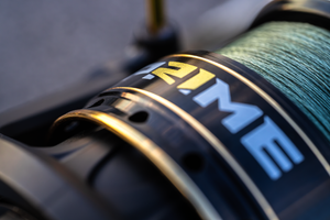 Close-up of the Abu Garcia + PRIME21 Collaboration black Spinning Reel. 
