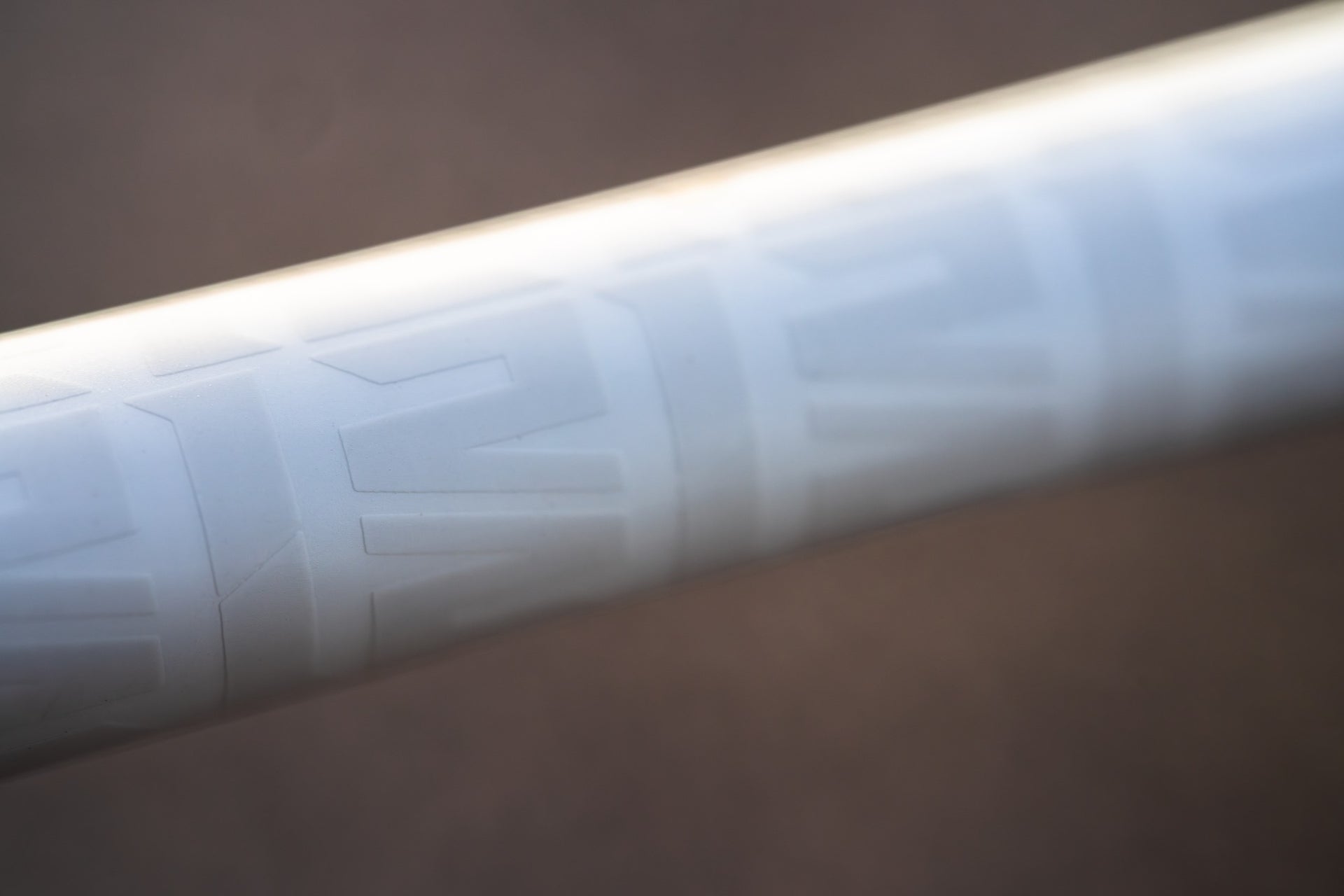 Close up of a Abu Garcia x PRIME21 white logo on a rod