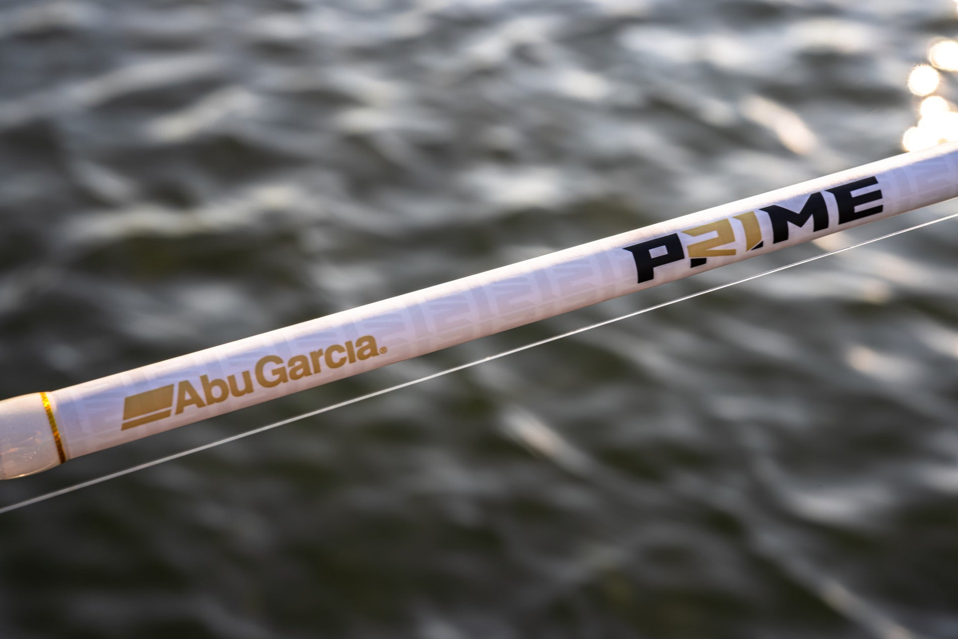 Close up of a Abu Garcia x PRIME21 Rod with black and gold logo