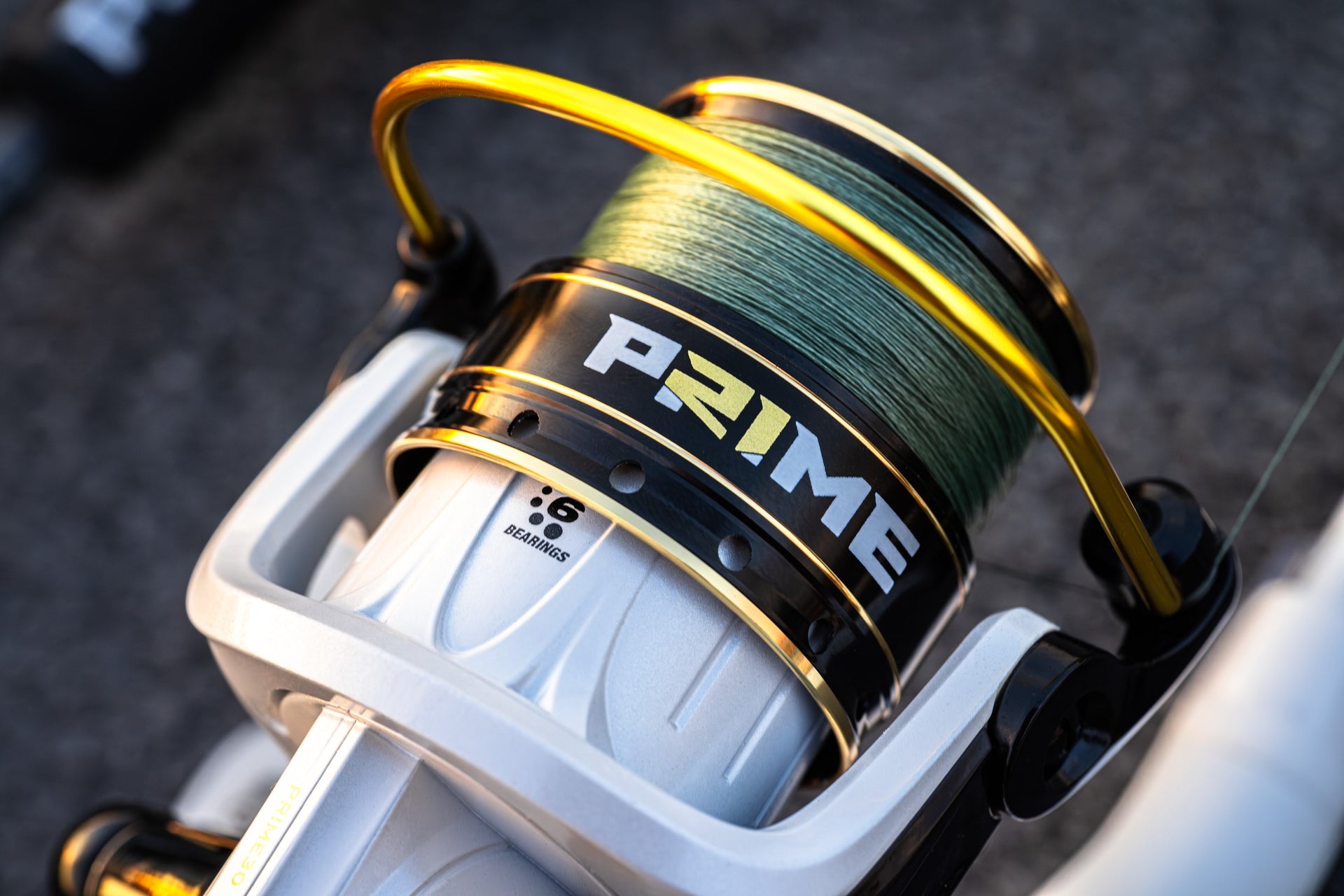 Close up of a Abu Garcia x PRIME21 Spinning Reel 