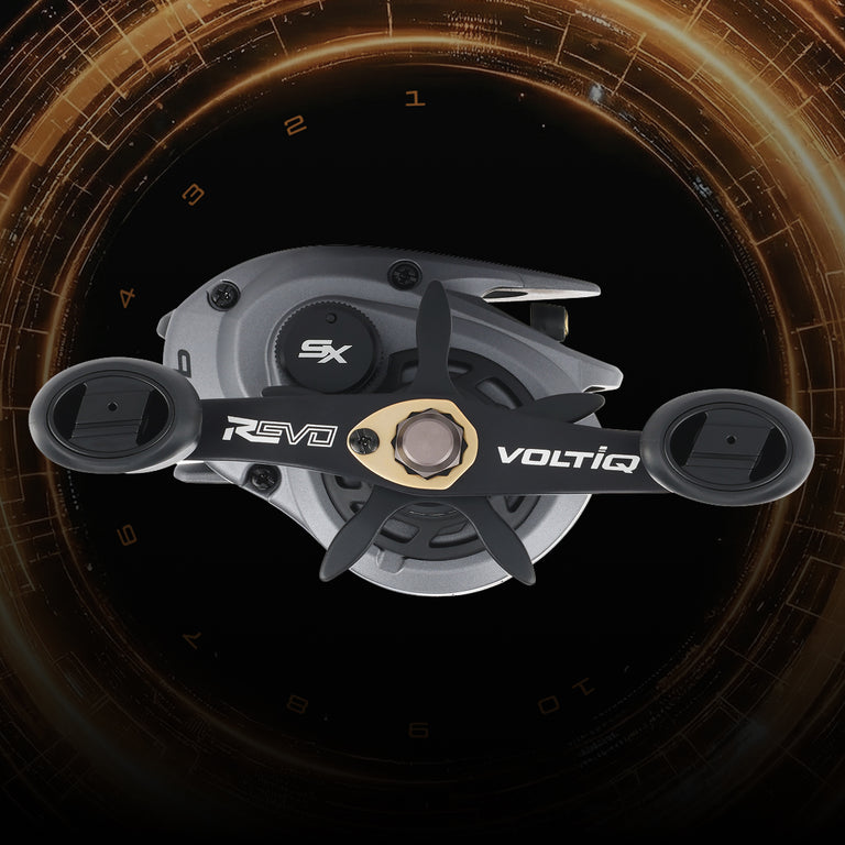 Close-up of a fishing reel with branded Abu Garcia Revo VoltiQ n a dark background