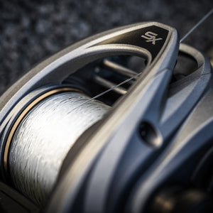 Close-up of a Revo® SX VoltiQ™ Low Profile Reel with a blurred background