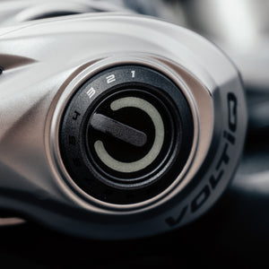 Close-up of a Revo® VoltiQ™ Low Profile Reel with a blurred background