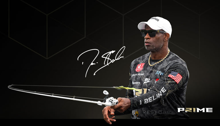 Person holding a fishing rod with a dark background and 'Prime' branding.