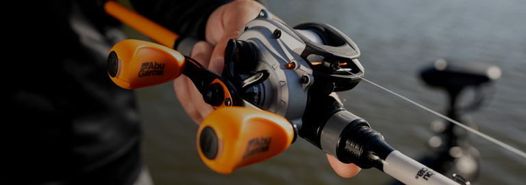 Ozark Trail Baitcast Rod & Reel Fishing Combo, Medium Action, 6.5ft Black  orange 