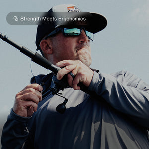 Man reeling in large fish