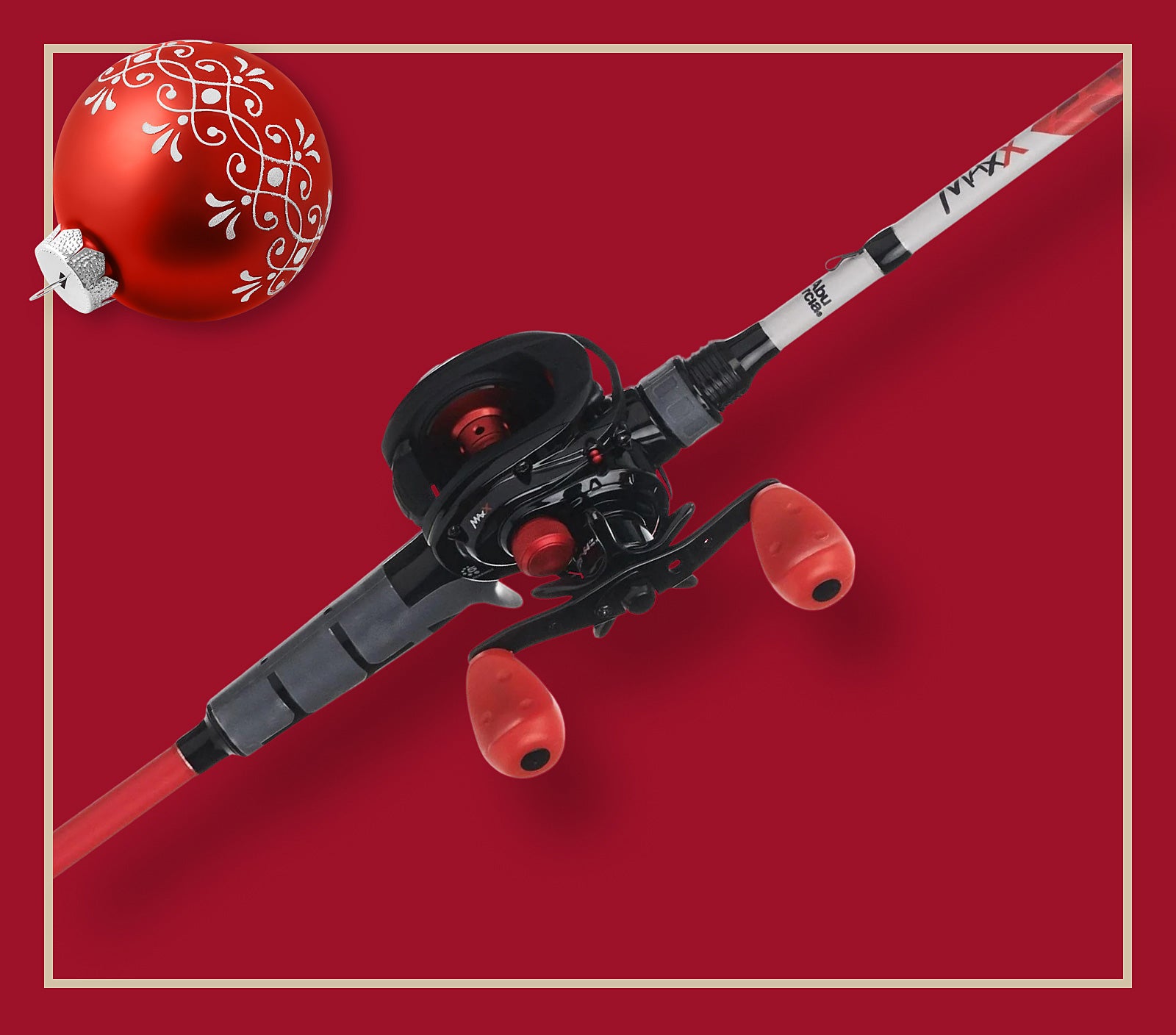 Fishing rod and reel set on a red background with a decorative ball.