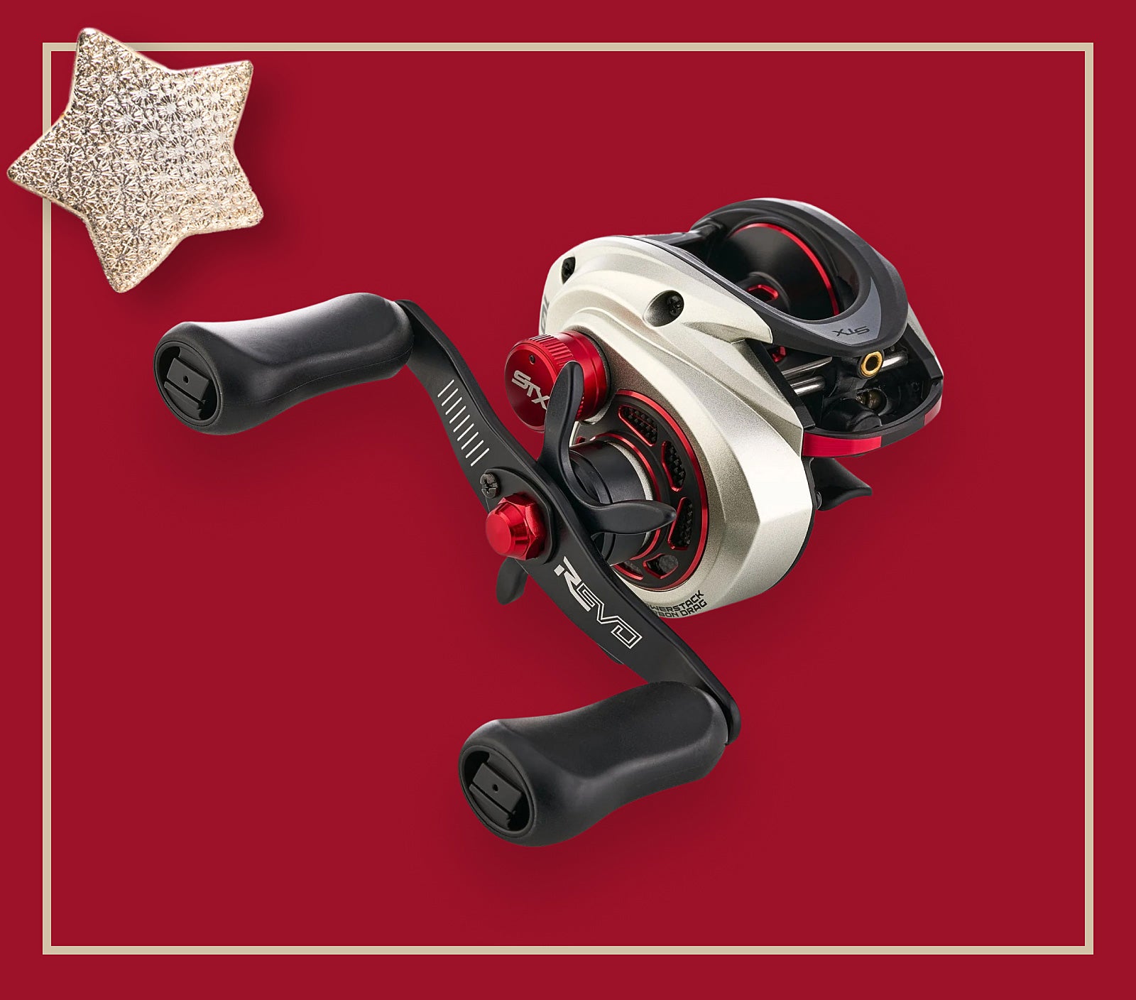 Fishing reel with star-shaped object on a red background