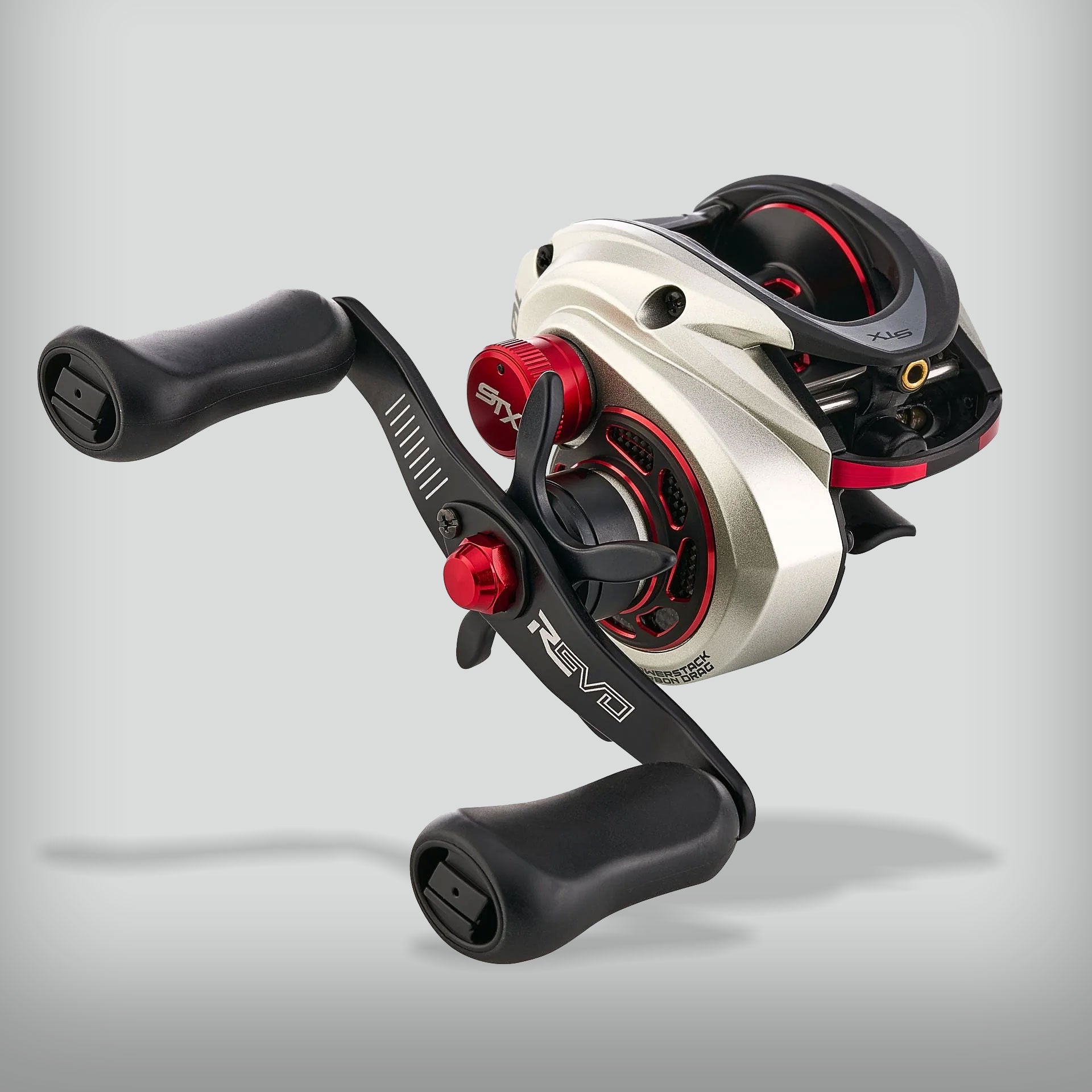 The Abu Garcia Revo STX LP Casting Reel delivers best-in-class precision, power, and performance with a lightweight aluminum frame and Asymmetric Design for a compact feel. An 11-bearing system ensures ultra-smooth operation, while the IVCB-6 Braking System provides superior control. The EXD Concept optimizes casting distance, and a 25lb Max Drag system delivers the strength needed to tackle tough fish. With a 95mm handle and oversized knobs for efficient winding, the Revo STX is built to dominate.